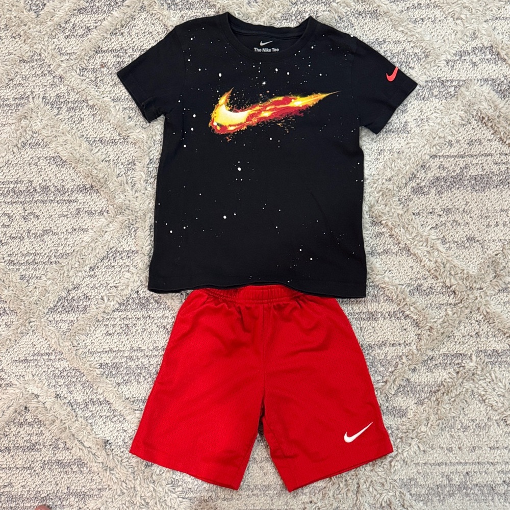 Nike Black Tee with Fiery Swoosh and Red Shorts